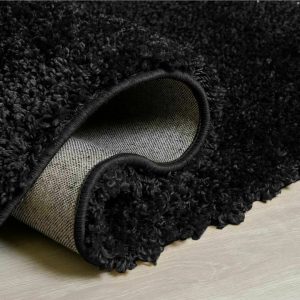 Ebern Designs Epiphany Solid Colour Shaggy Black Area Rug black 120.0 H x 120.0 W x 1.2 D cm
